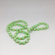 Vintage 1950s Light Green Silk Thread Wrapped Beads With Gold Tone Spacers.