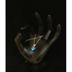 Sterling Silver Blue Swiss Topaz And Four Diamond Pendant Necklace